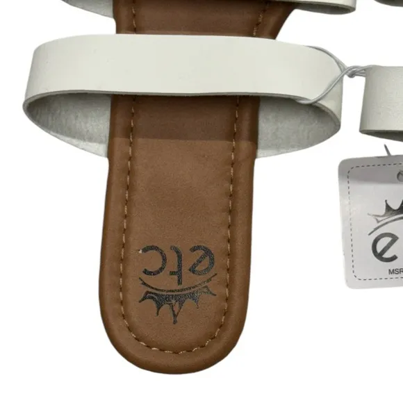 Etcetera size 8/9 NWT slide on style sandals. Tan with white straps along top.