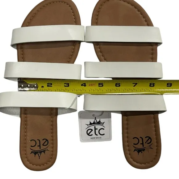 Etcetera size 8/9 NWT slide on style sandals. Tan with white straps along top.