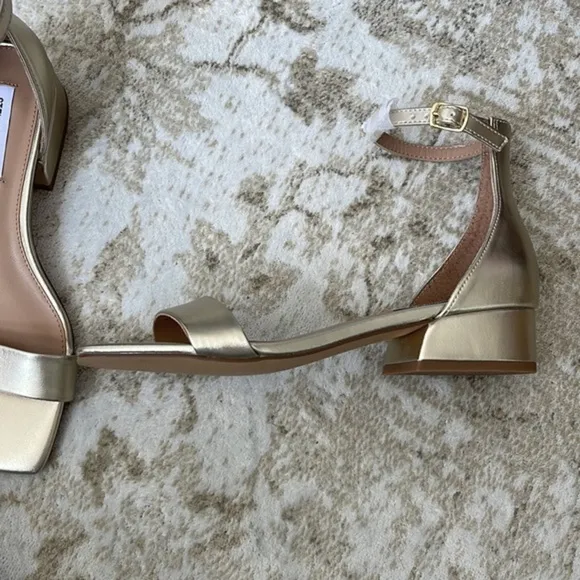Steve Madden kitten heel square toe sandals in gold.