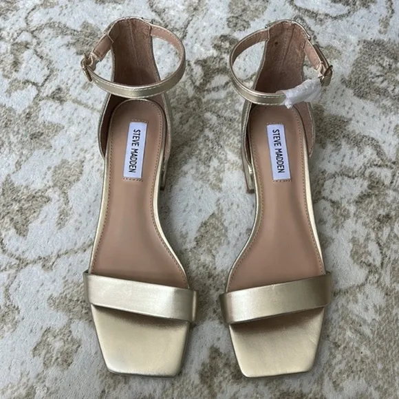 Steve Madden kitten heel square toe sandals in gold.